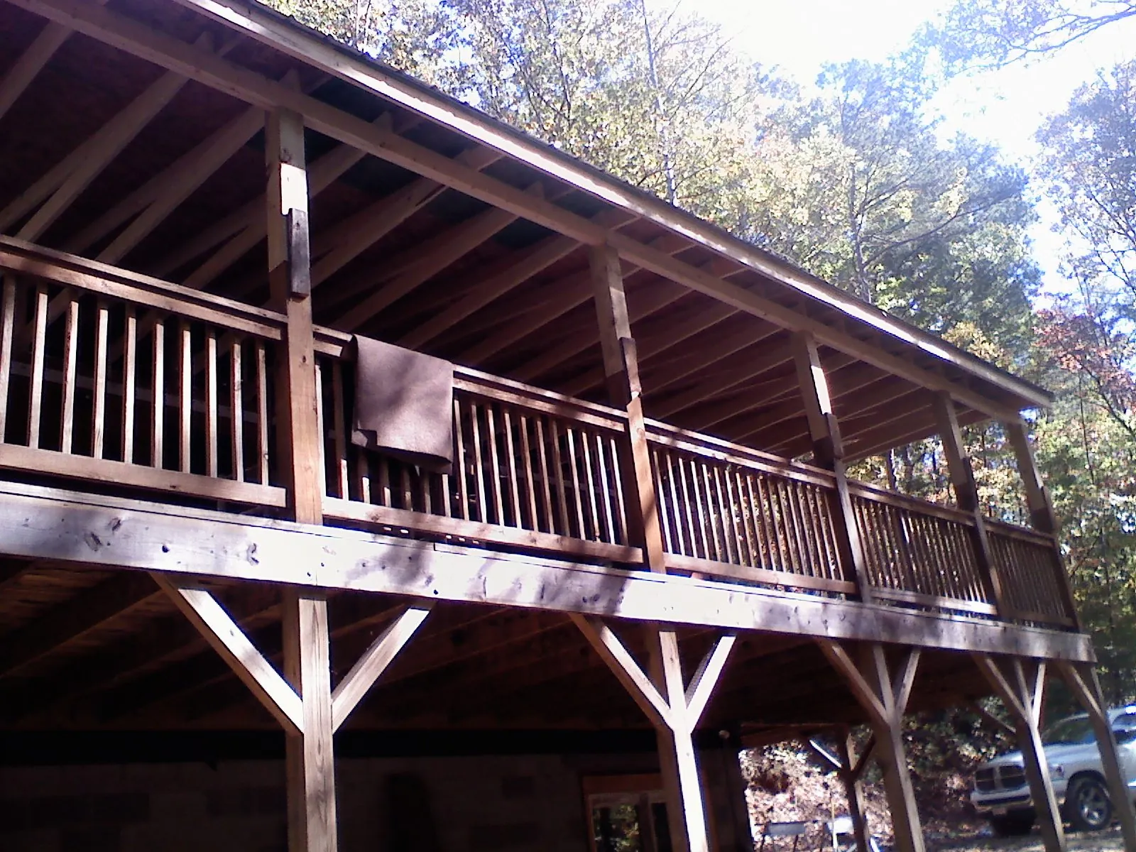 Timber framing under a new elevated porch and deck — Roof Leak Repair in Montpelier by Roofing Brothers